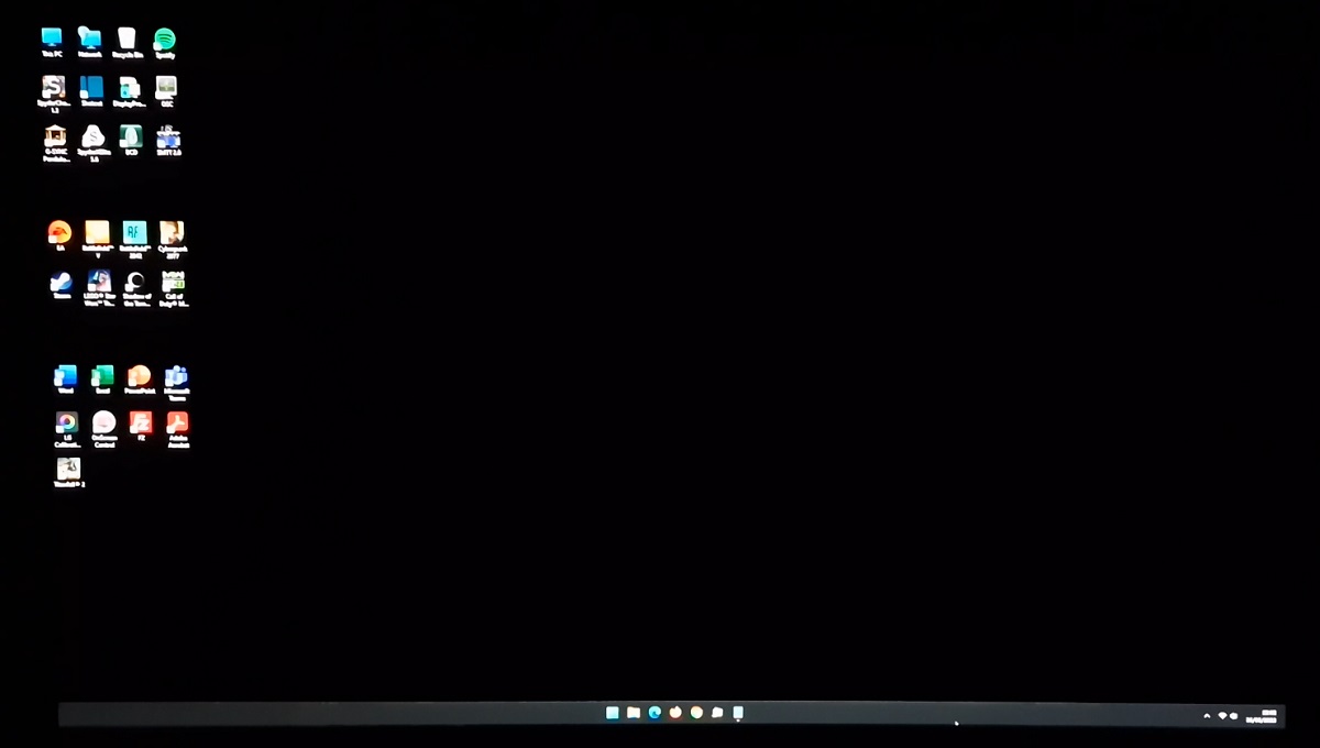 Black desktop background in dark room